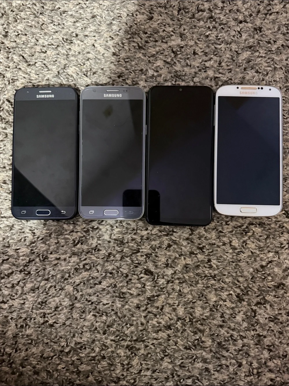 Samsung Lot of Four Phones - Black, Silver, Navy, White